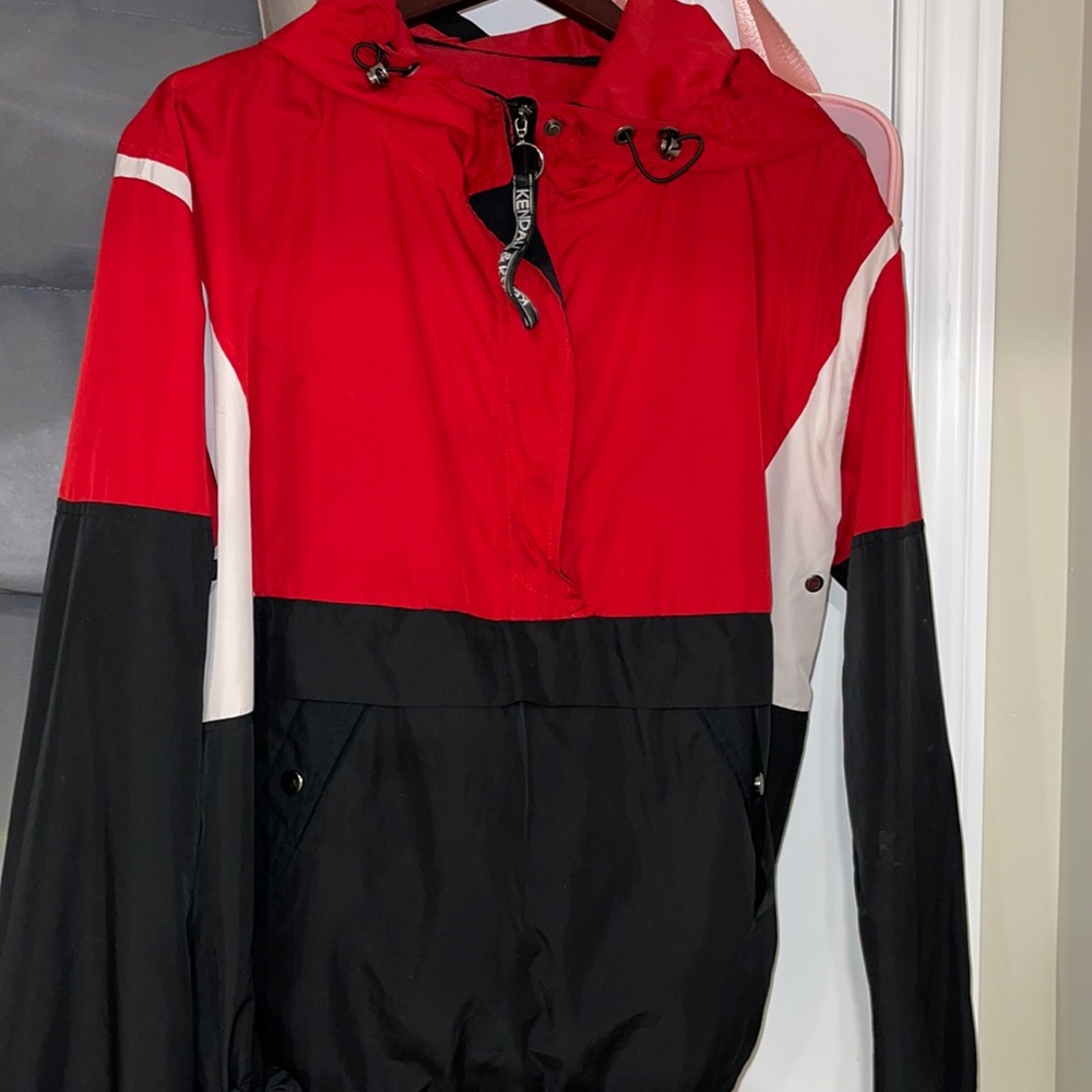 Its in red and black with little white lines